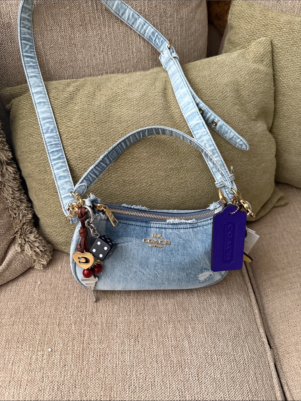 Coach Light Denim Crossbody Bag with Purple Tag and Charms